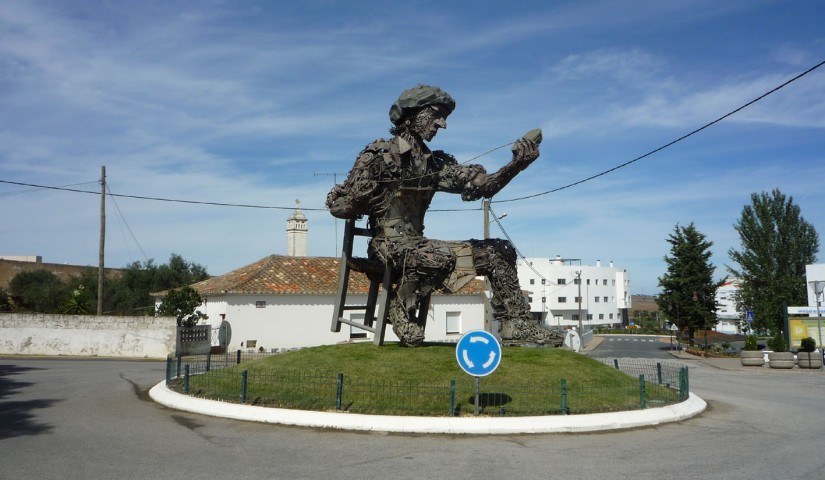 Statue of cobbler on roundabout in Aljustrel